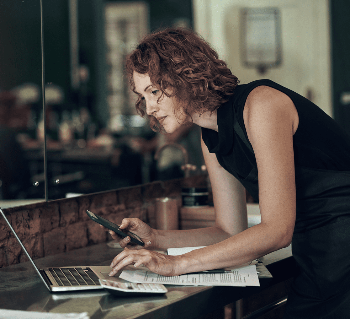 Focused professional using technology